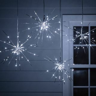 4 lumières de Noël scintillantes en argent Starburst