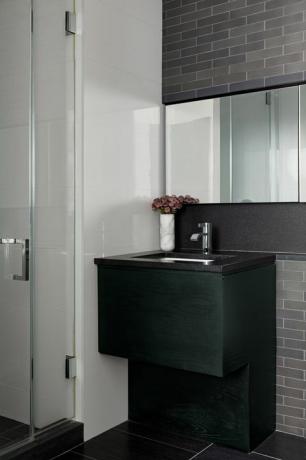 salle de bain, vanité verte avec comptoir noir