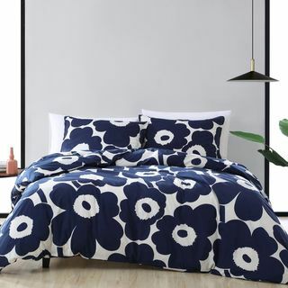 Ensemble housse de couette et couvre-oreillers Marimekko Unikko en bleu indigo