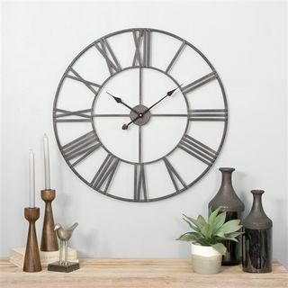 Horloge murale ronde en métal Solange