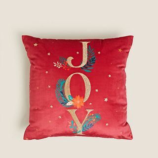 Coussin brodé à slogan Velvet Joy